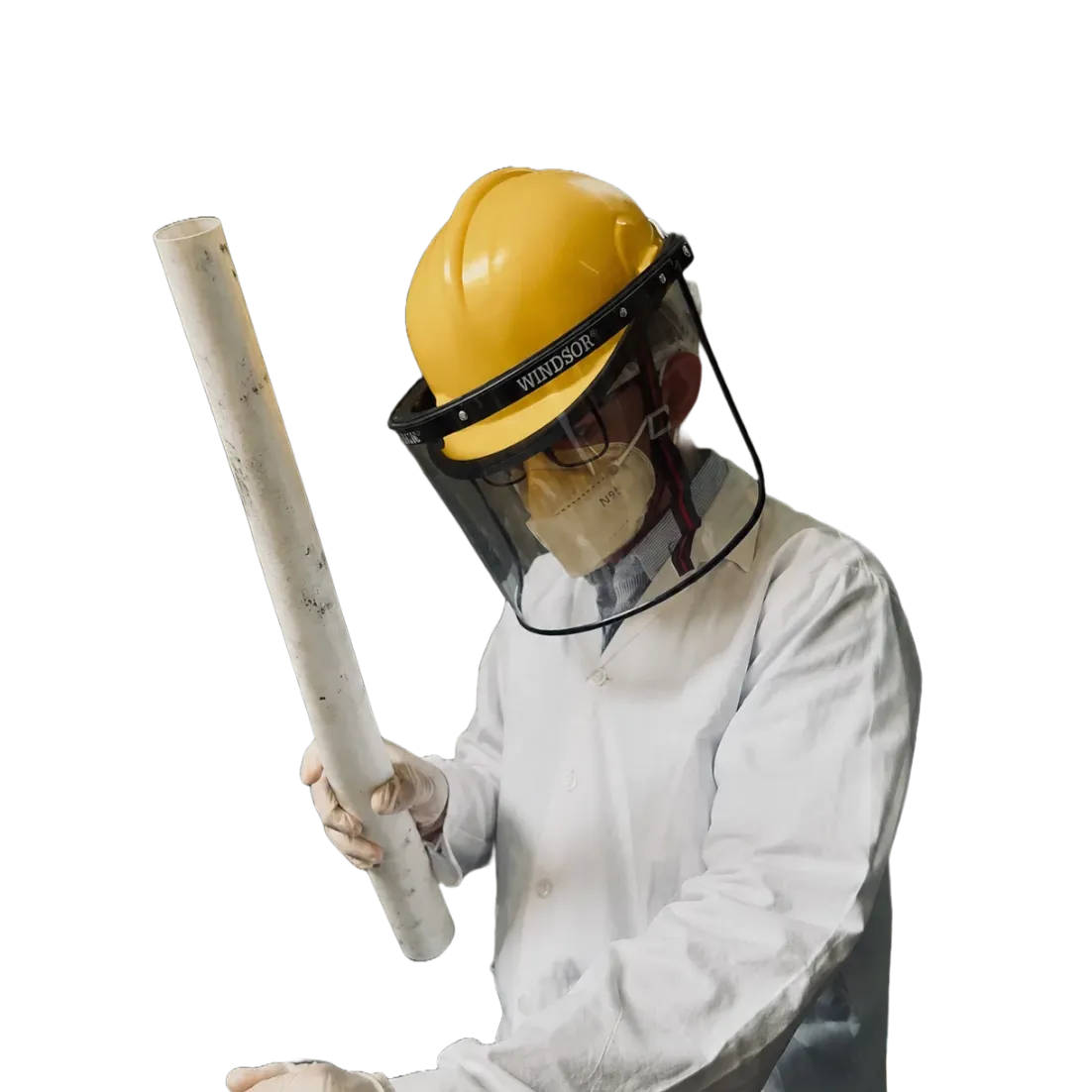 Dhairya Pandya in protective gear holding a rocket airframe tube
